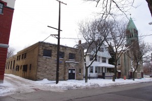 These buildings were acquired by the school and will play a role in future planning. The building on the left will become a new Labre kitchen and wrestling facility, while the church on the right may play one of several potential roles. 