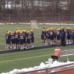 The Wildcats warm up for what would be a 9-7 win over University School in their season opener. 