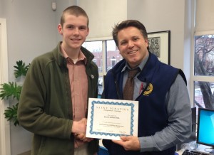 Sean Sovacool '15 and Mr. Hess smile after Sean won $250 to aid in his already existing micro-marketing business. 