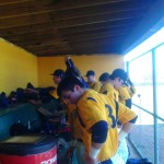 The Wildcats in the dugout before game time Wednesday.